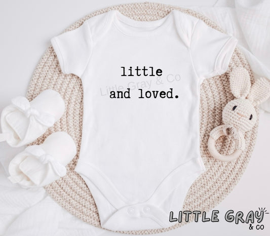 Little and loved baby vest